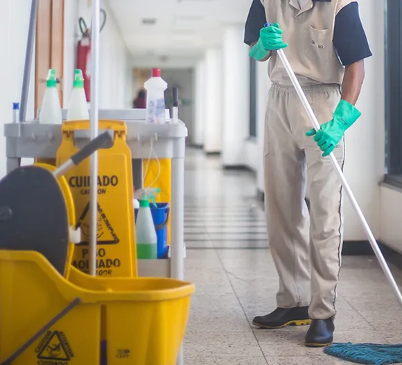 Mop bucket and cleaning supplies used for office janitorial maintenance in Grand Rapids MI.