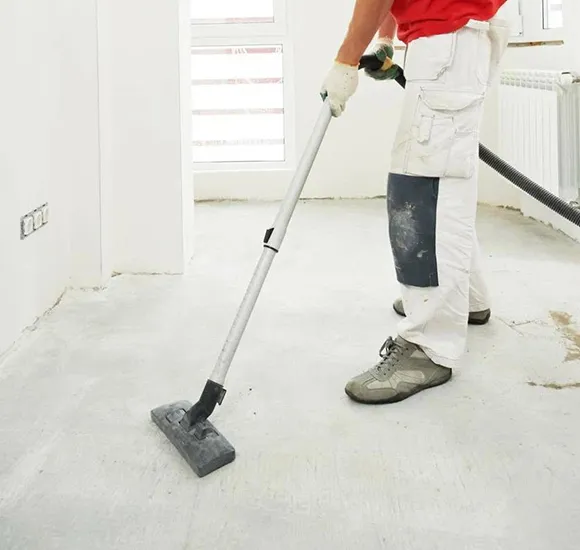 Vacuuming floor at a post construction site in Grand Rapids MI.