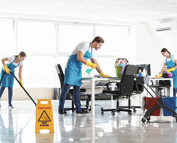 Commercial cleaning staff cleaning a modern office space in Ann Arbor MI.